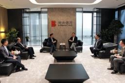 光大信托党委书记冯翔会见中金资本总裁单俊葆